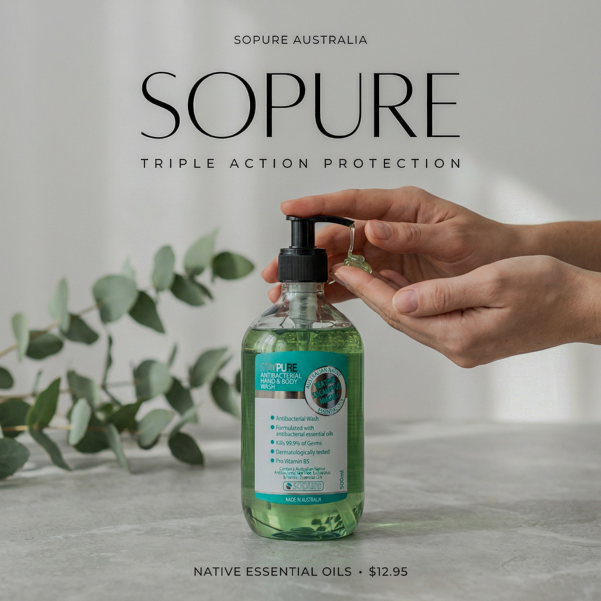 Sopure Australia hand sanitizer bottle with pump being held, green leaves in the background